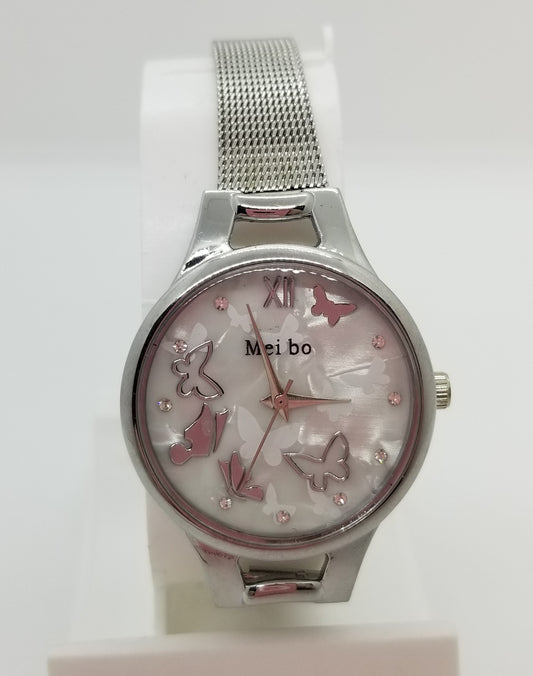 Silver base metal watch with butterflies on the dial of the